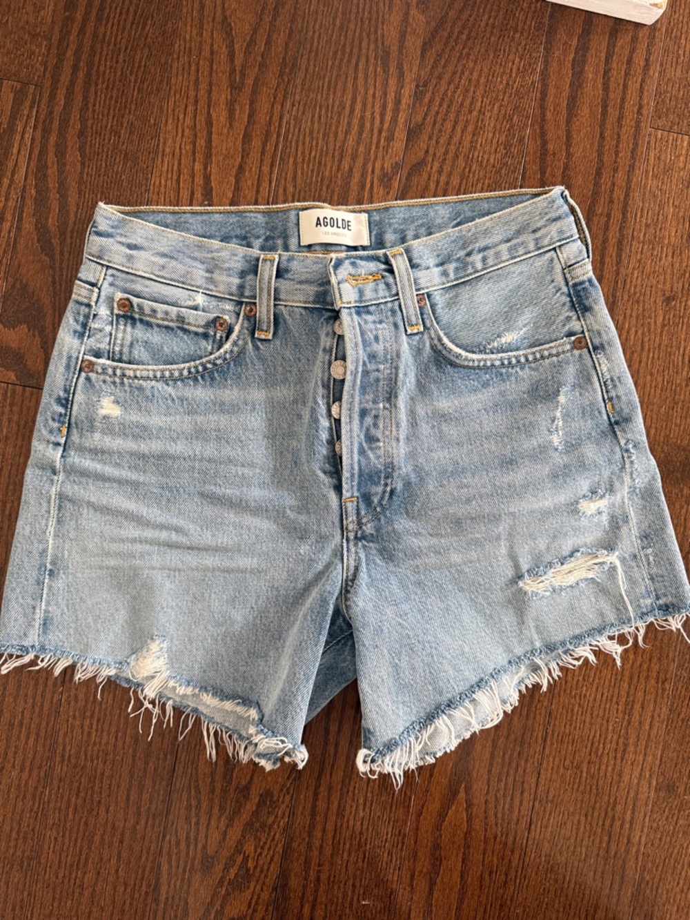 Agolde Light Wash Distressed Denim Cutoff Shorts